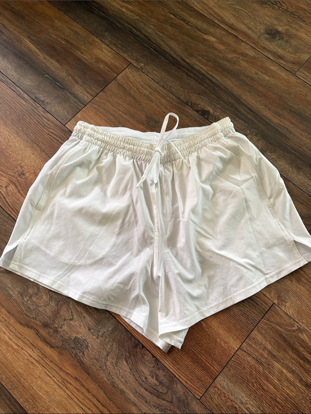 Lululemon Athletica white shorts. NWOT- never worn and in perfect condition.